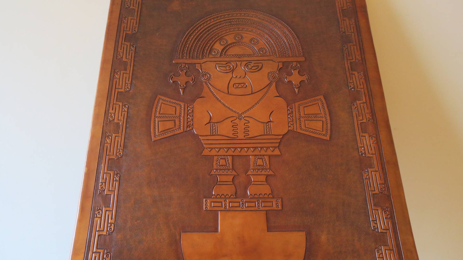 Tiahuanaco design tooled leather folding armchair by Angel Pazmino, Ecuador