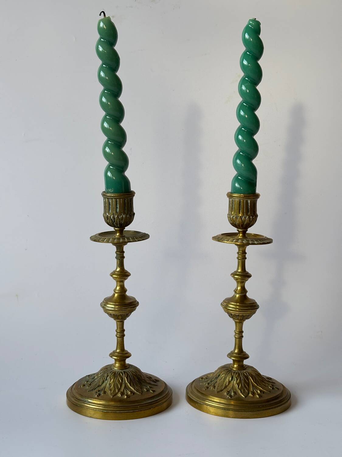 Pair of neoclassical brass candlesticks
