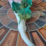 Bouquetiere depicting a flower. Sign. Ceramic.