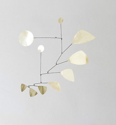 Mobile modernist brass 65 x 70