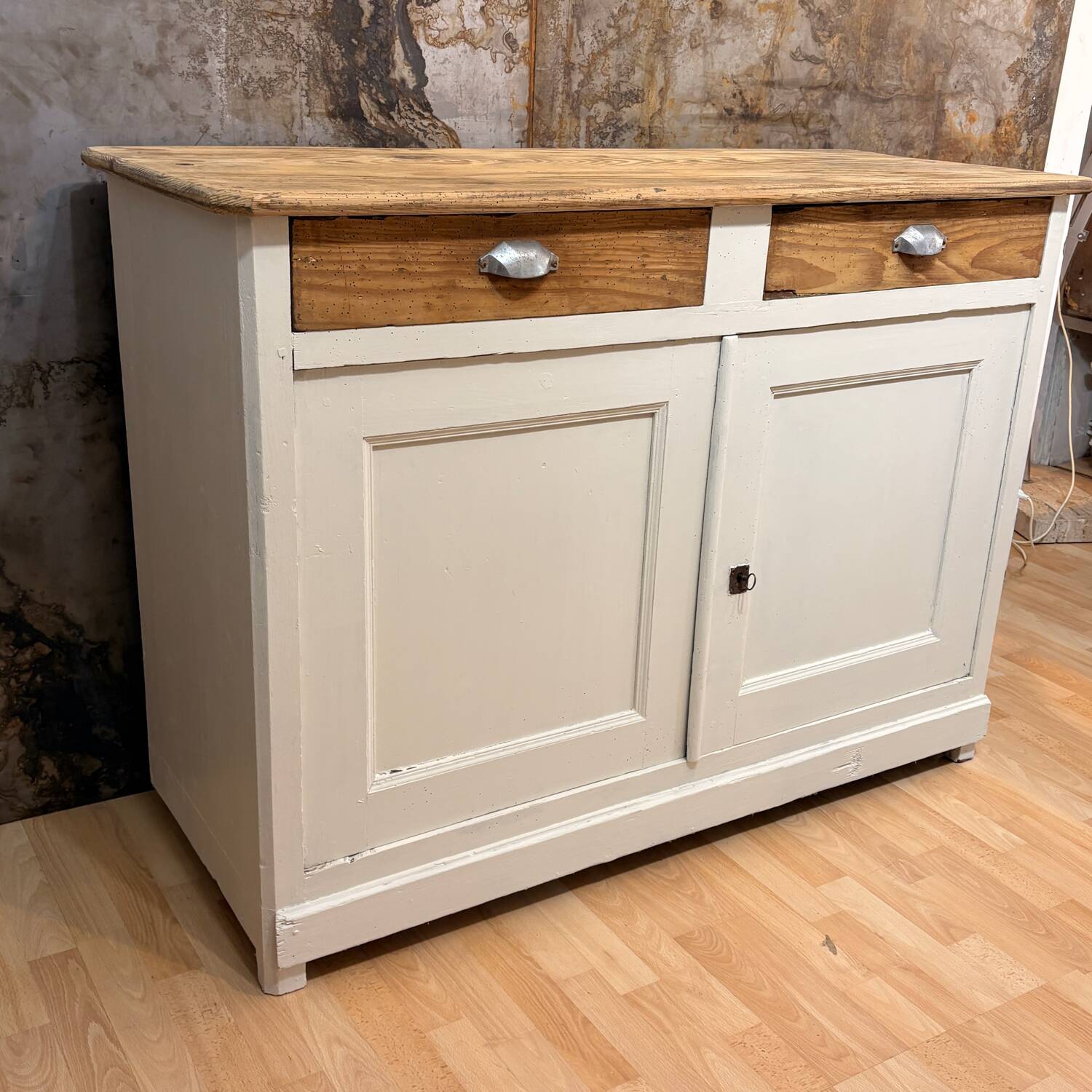 Rustic wooden and paper Parisian buffet
