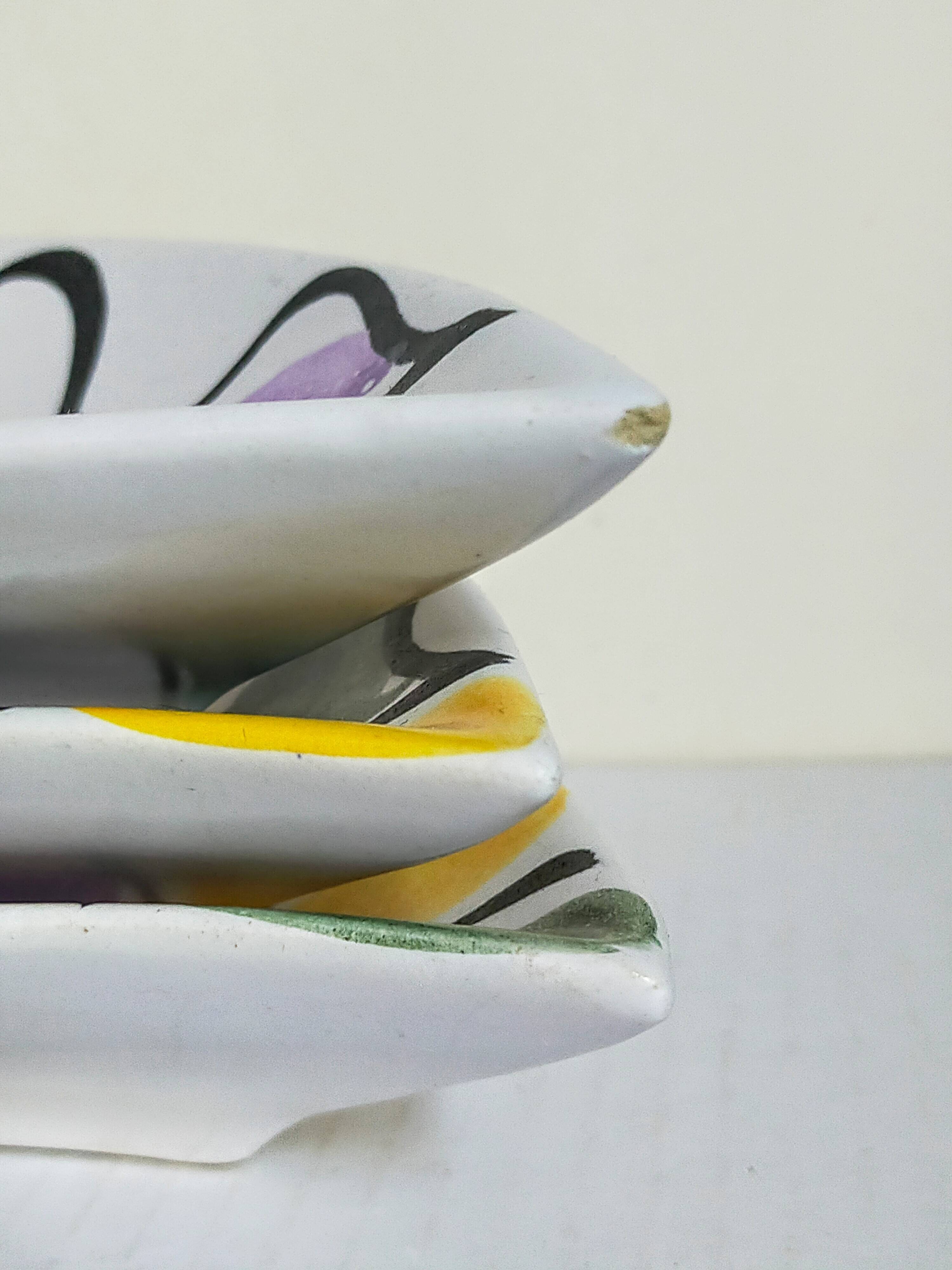 Three vintage free-form ceramic ravine dishes from the 1950s