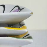 Three vintage free-form ceramic ravine dishes from the 1950s