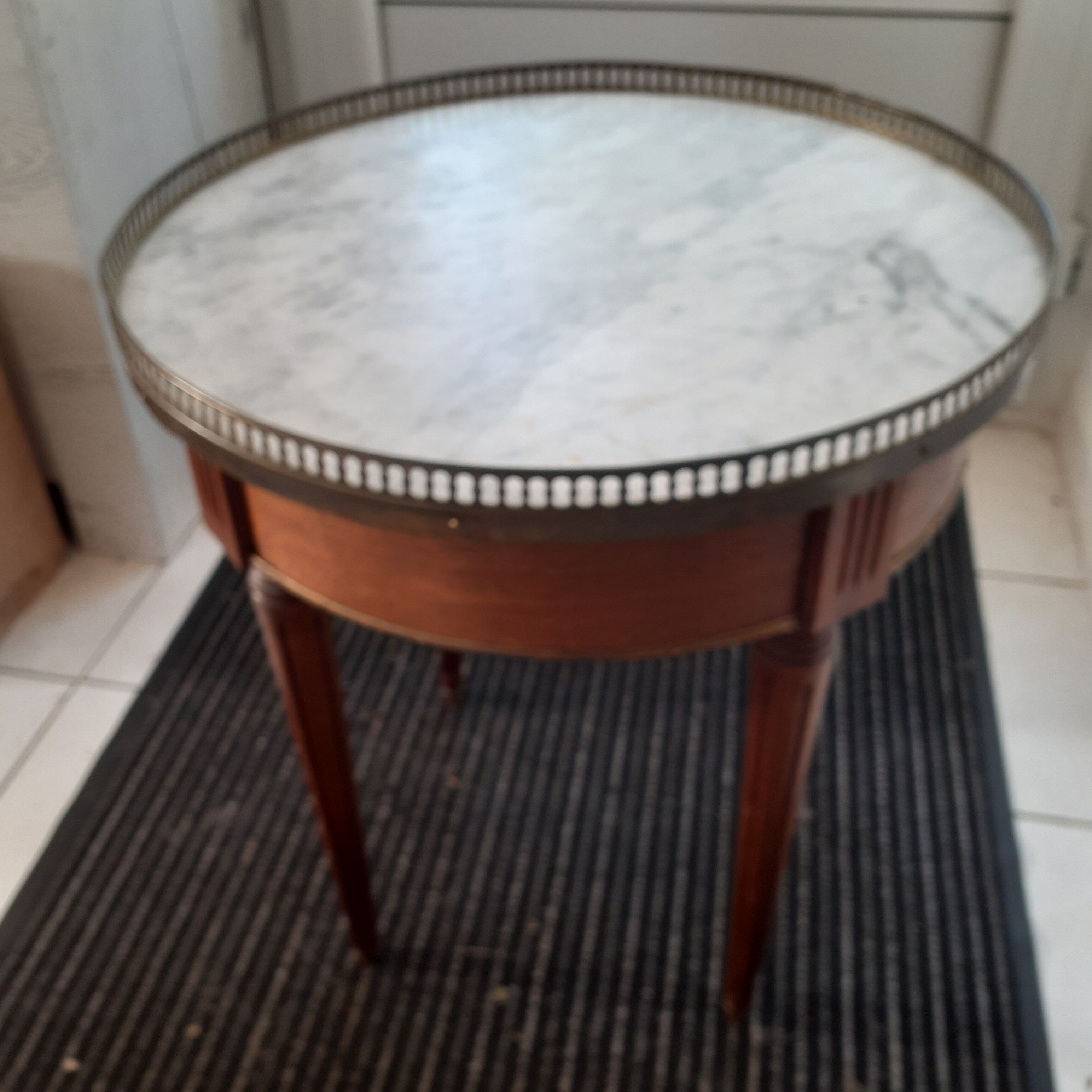 Round cherry guerion with white marble top