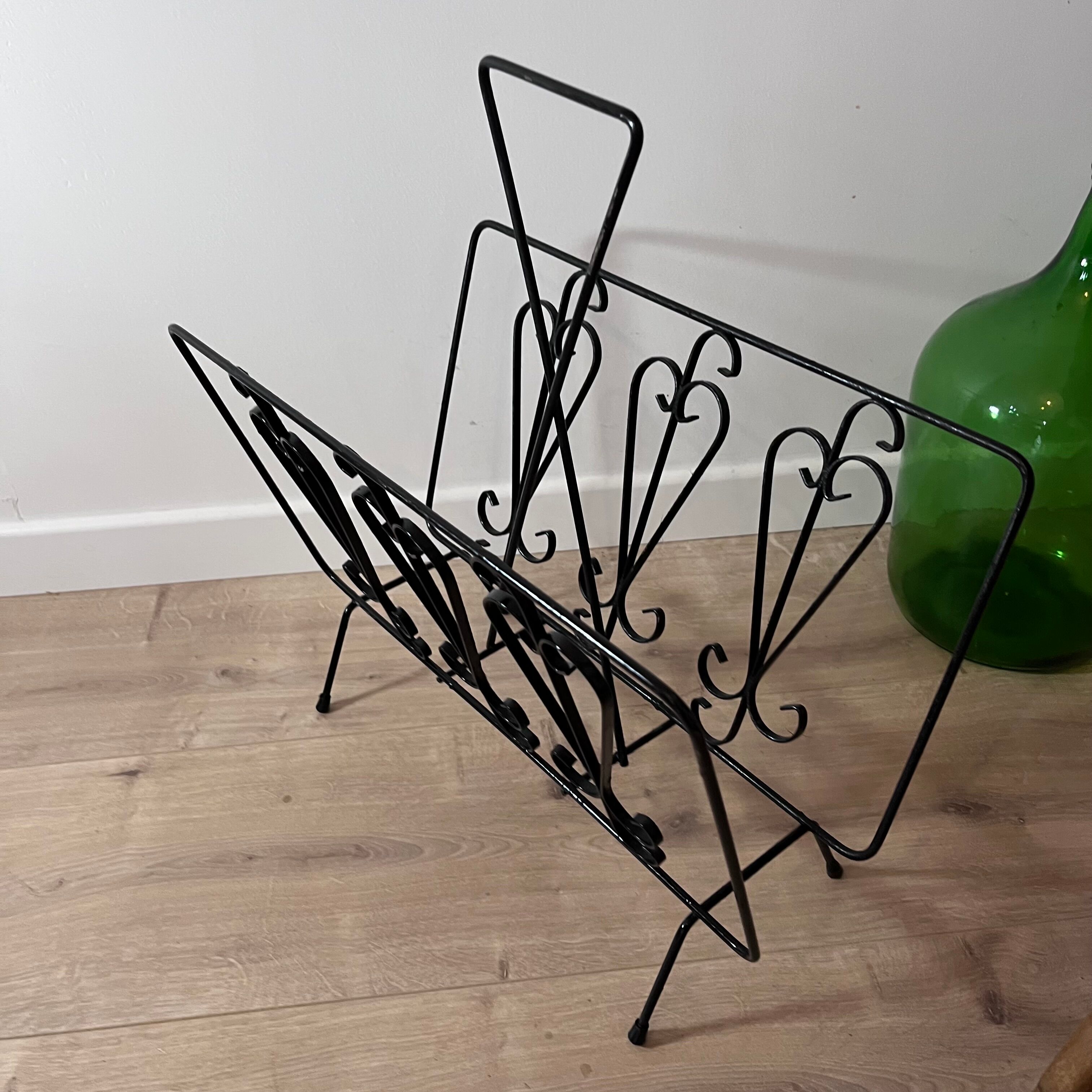 Black steel magazine holder