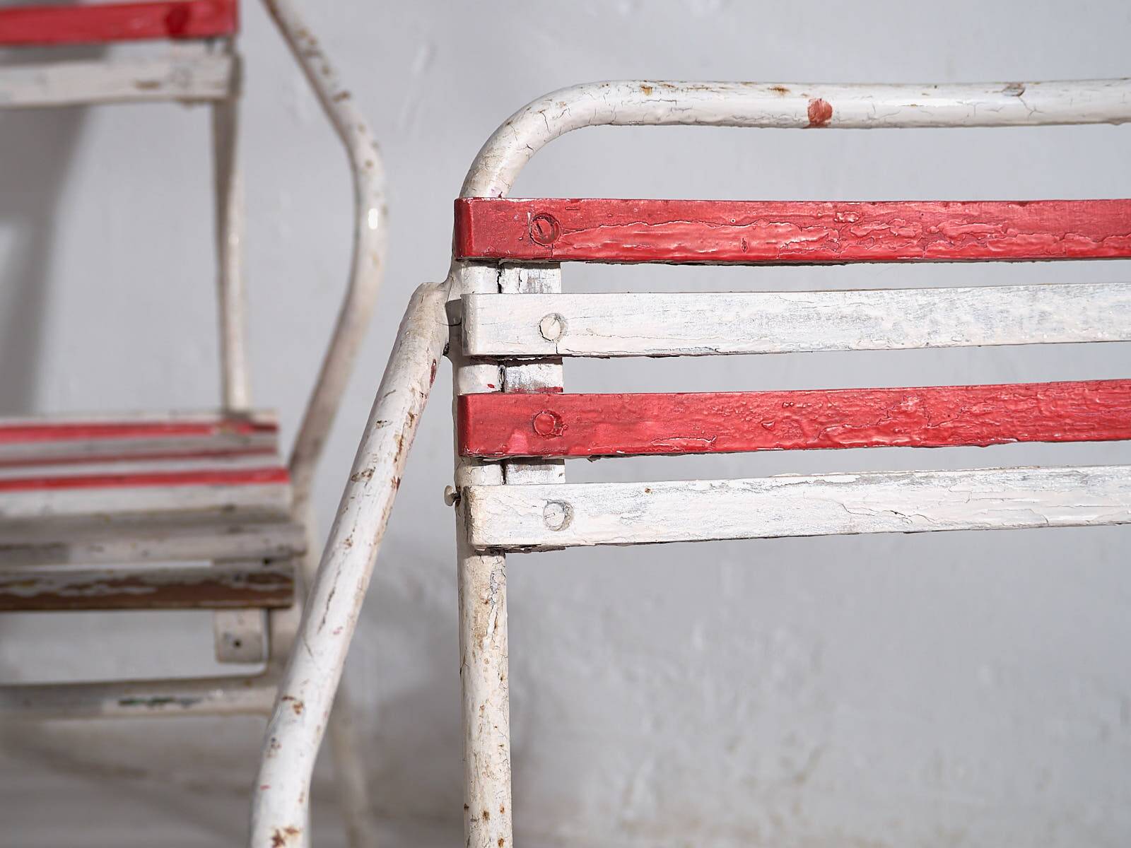 Antique outdoor stacking chairs (circa 1920). Set of 2 pieces.