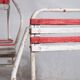 Antique outdoor stacking chairs (circa 1920). Set of 2 pieces.