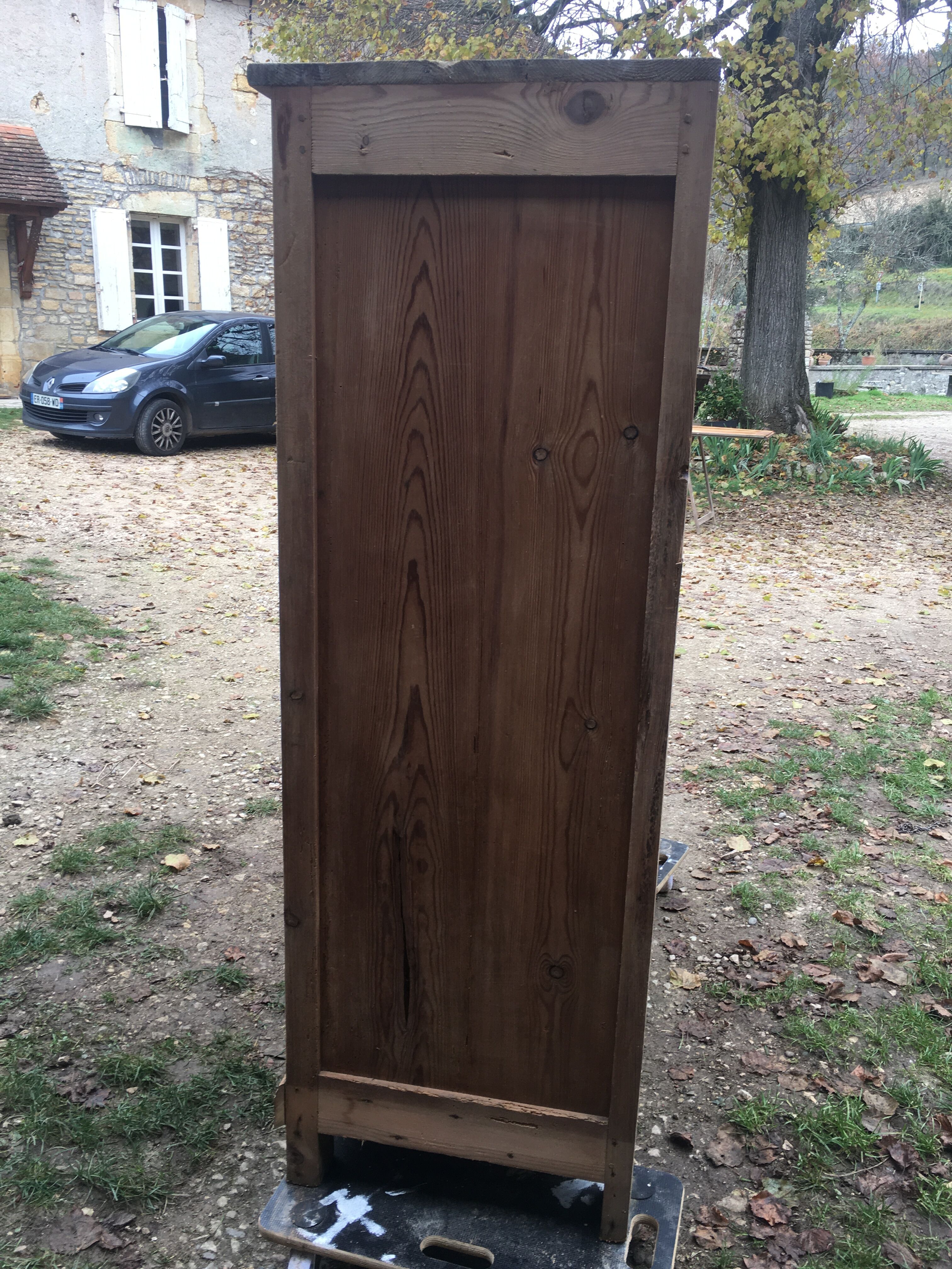 Wooden cabinet with interior doors