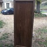 Wooden cabinet with interior doors