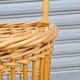 Vintage wicker log basket on vintage wheels
