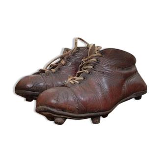 Pair of old football boots, vintage sport