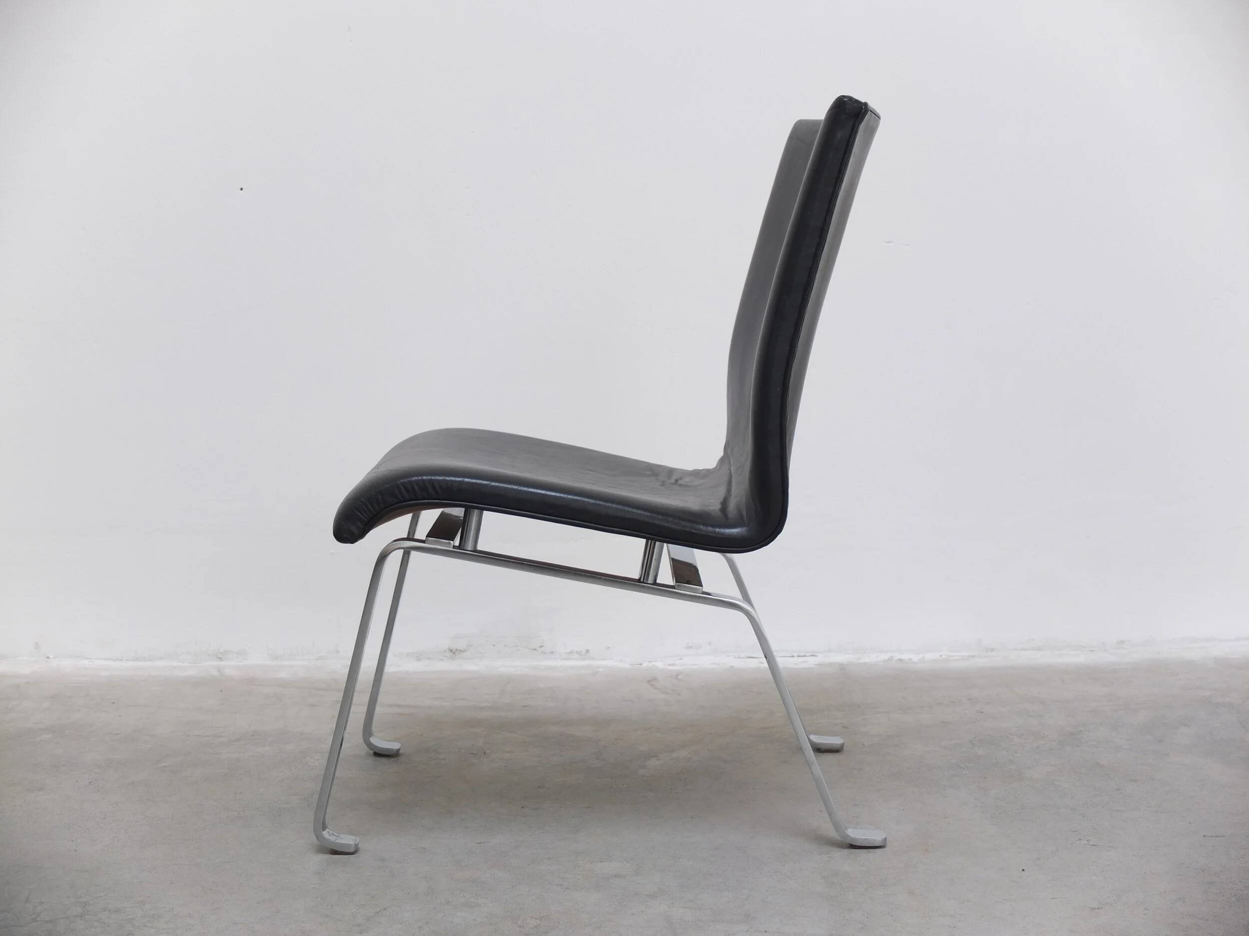 Unique black leather & steel modernist lounge chair, 1960s