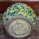 polychrome floral-decorated jug in glazed ceramic
