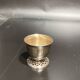Egg cup with silver metal spoon