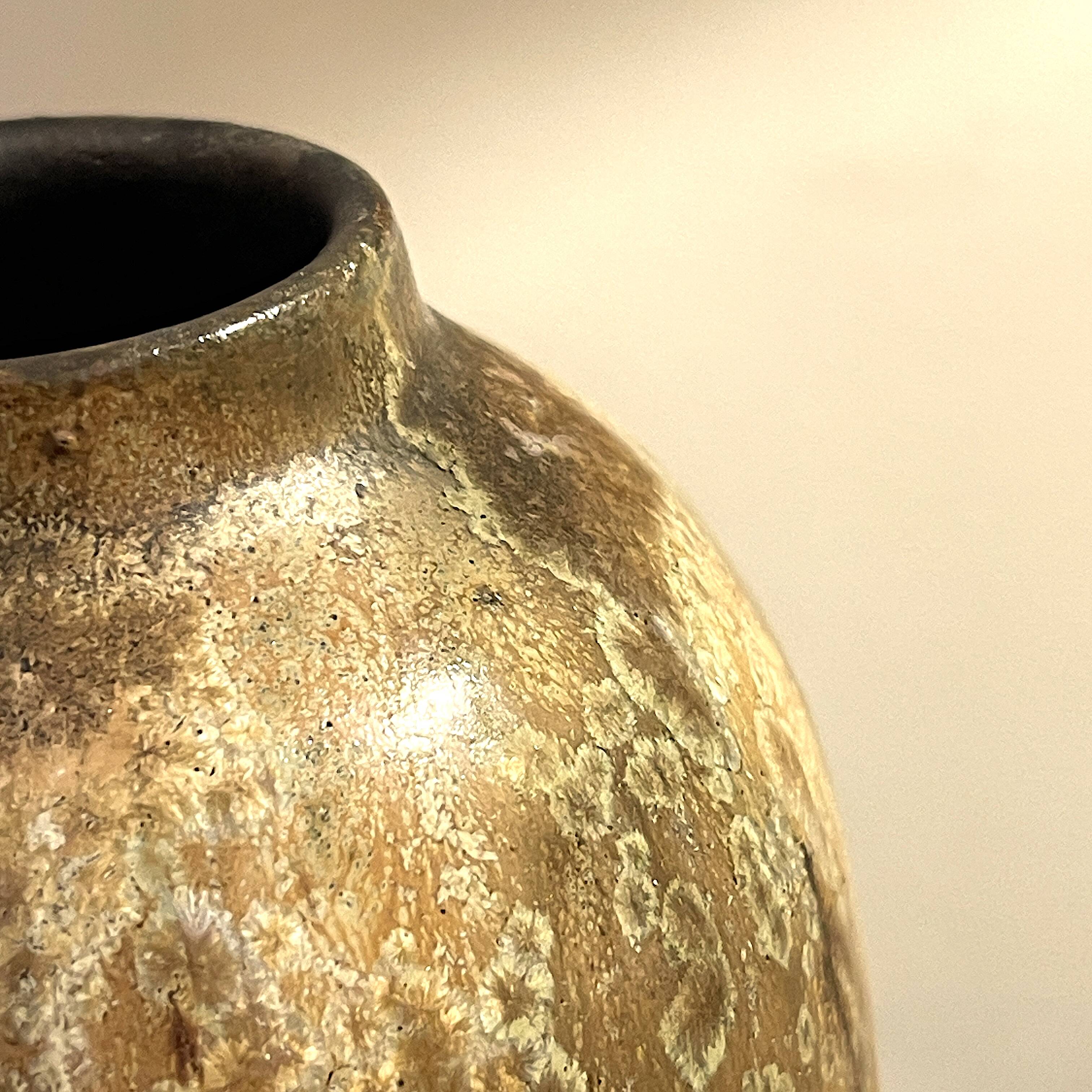 art nouveau brown 'colocynth' vase with three handles, roger guerin