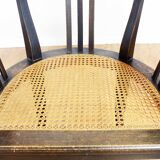 Old chair made of solid wood and caning