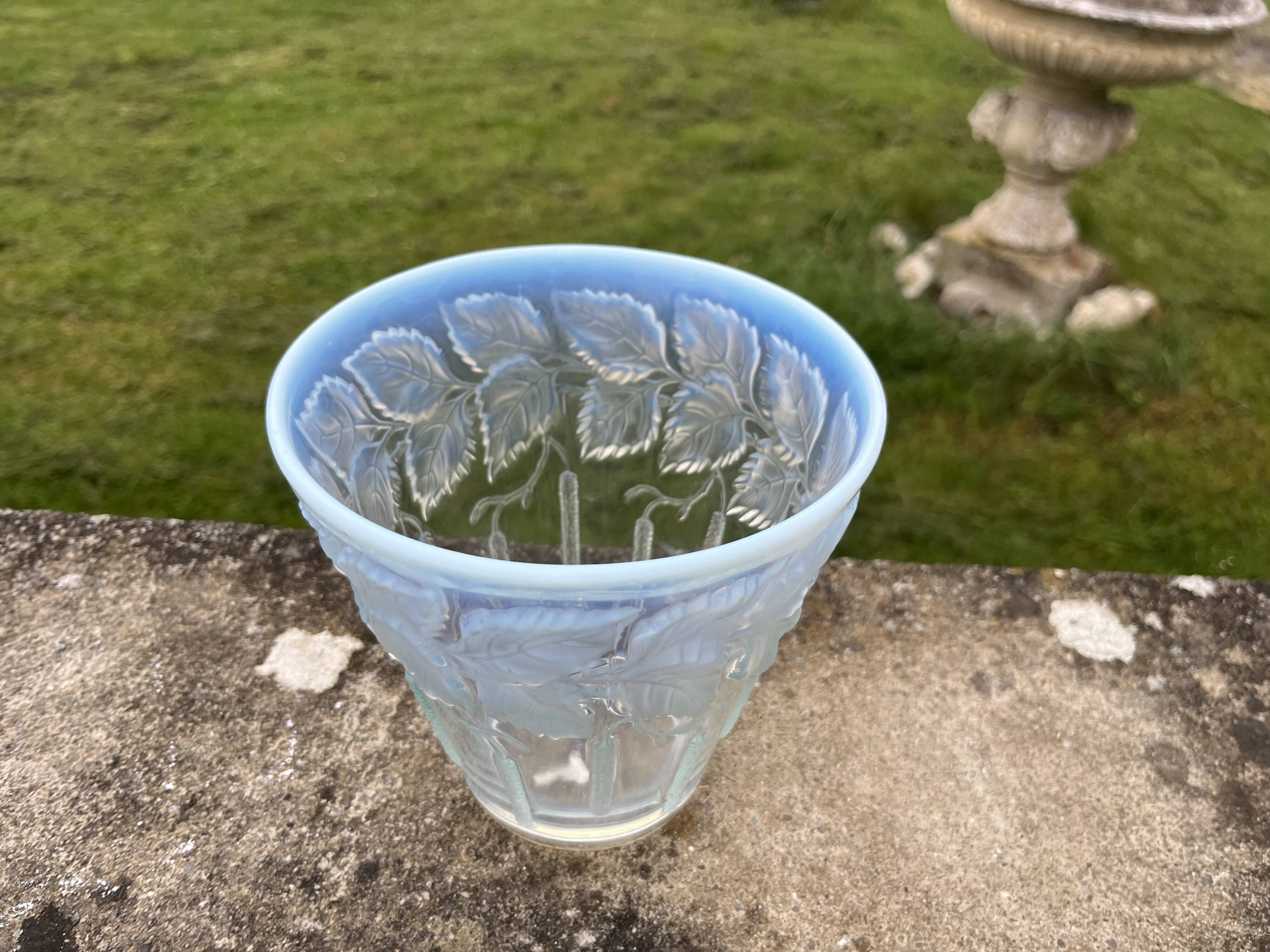 Opalescent glass vase moulded with leaf and catkin decoration – in the style of Lalique.