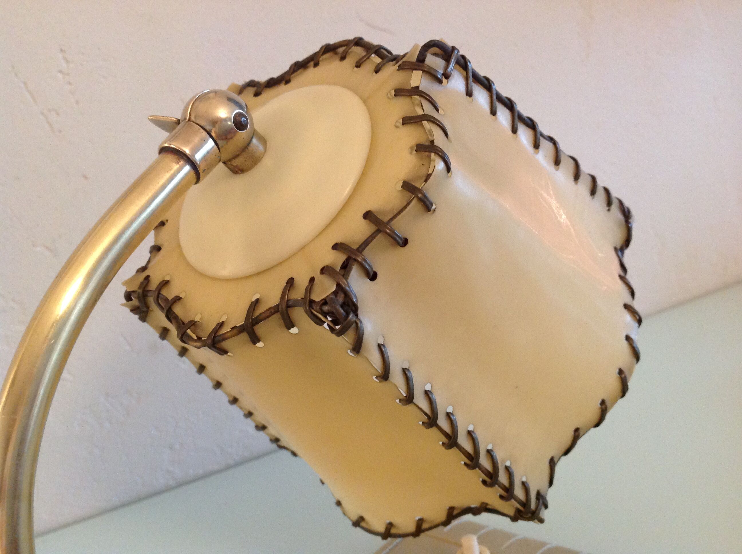 Brass bedside lamp and beige lampshade art deco style