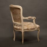 Pair of Louis XV style armchairs – Carved, gilded wood and brocade fabric