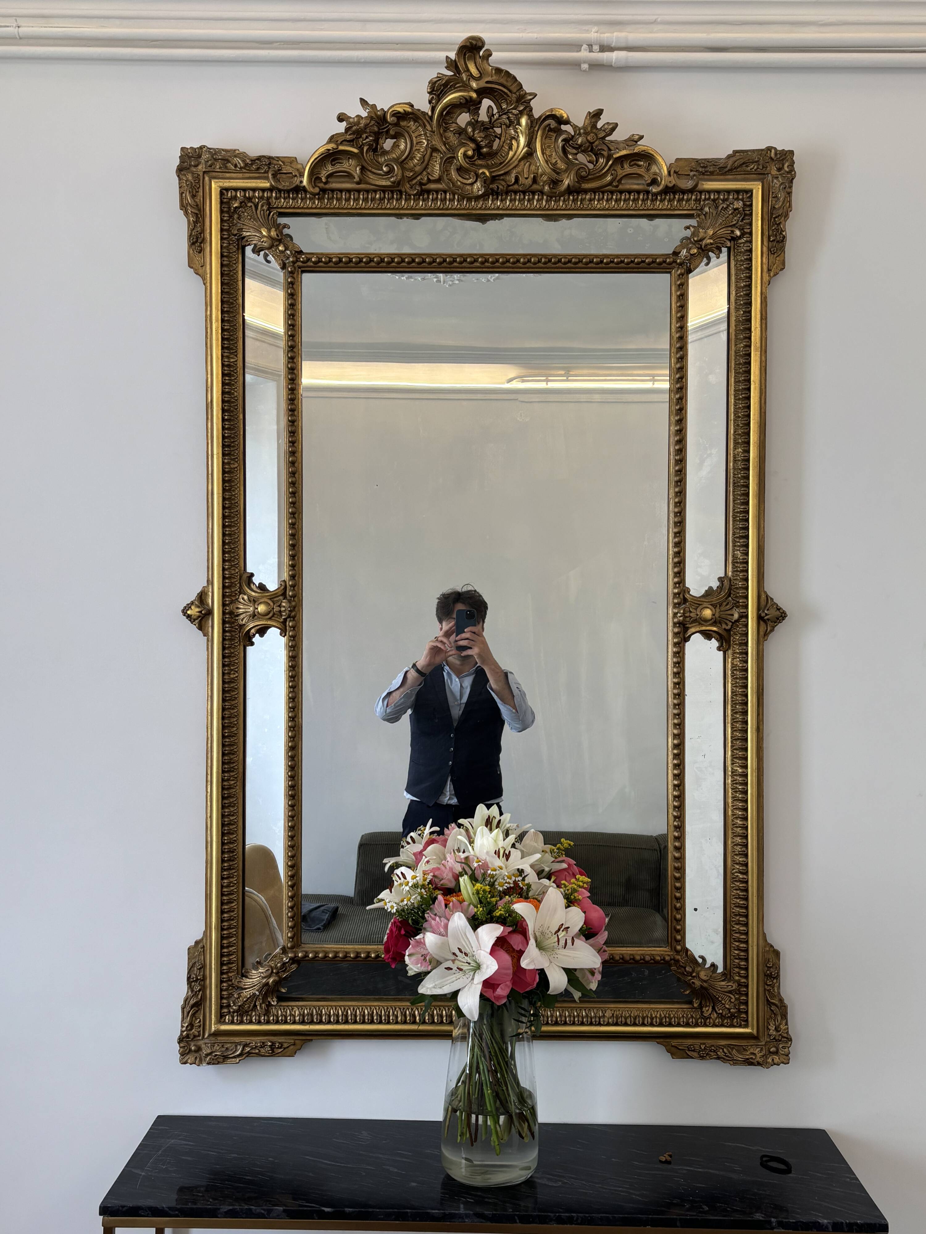 Louis XV style mirror with moulded gilded wood and stucco from the Napoleonic III era.