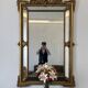 Louis XV style mirror with moulded gilded wood and stucco from the Napoleonic III era.