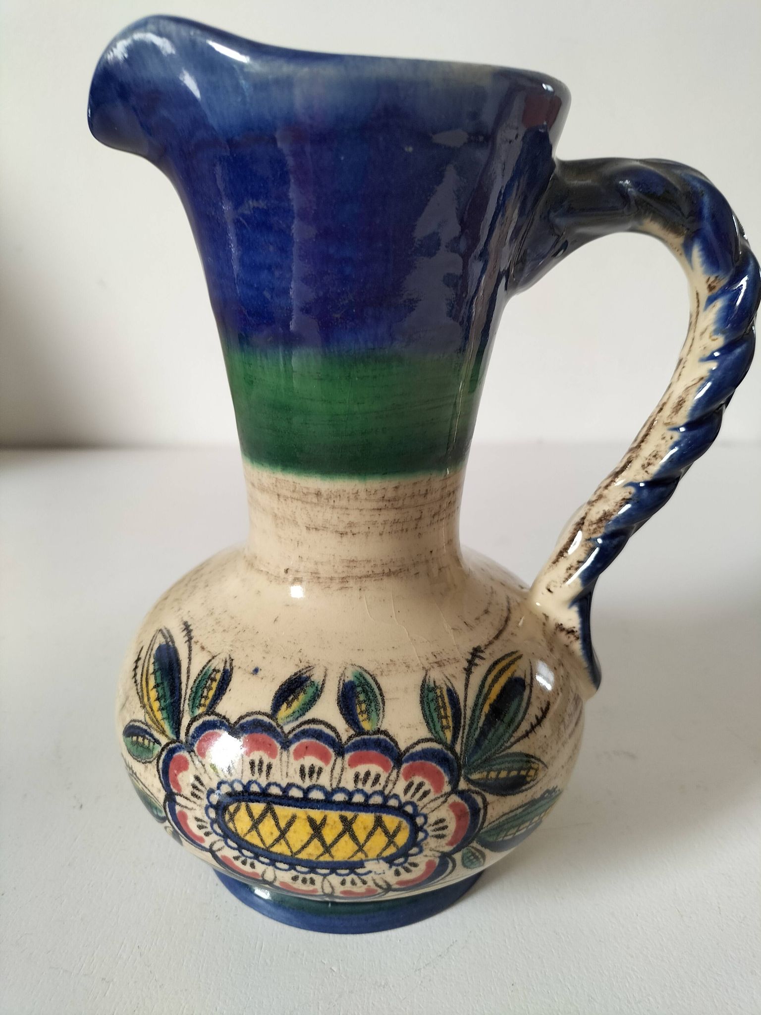 Earthenware pitcher with rustic floral decoration – 1950s-1970s