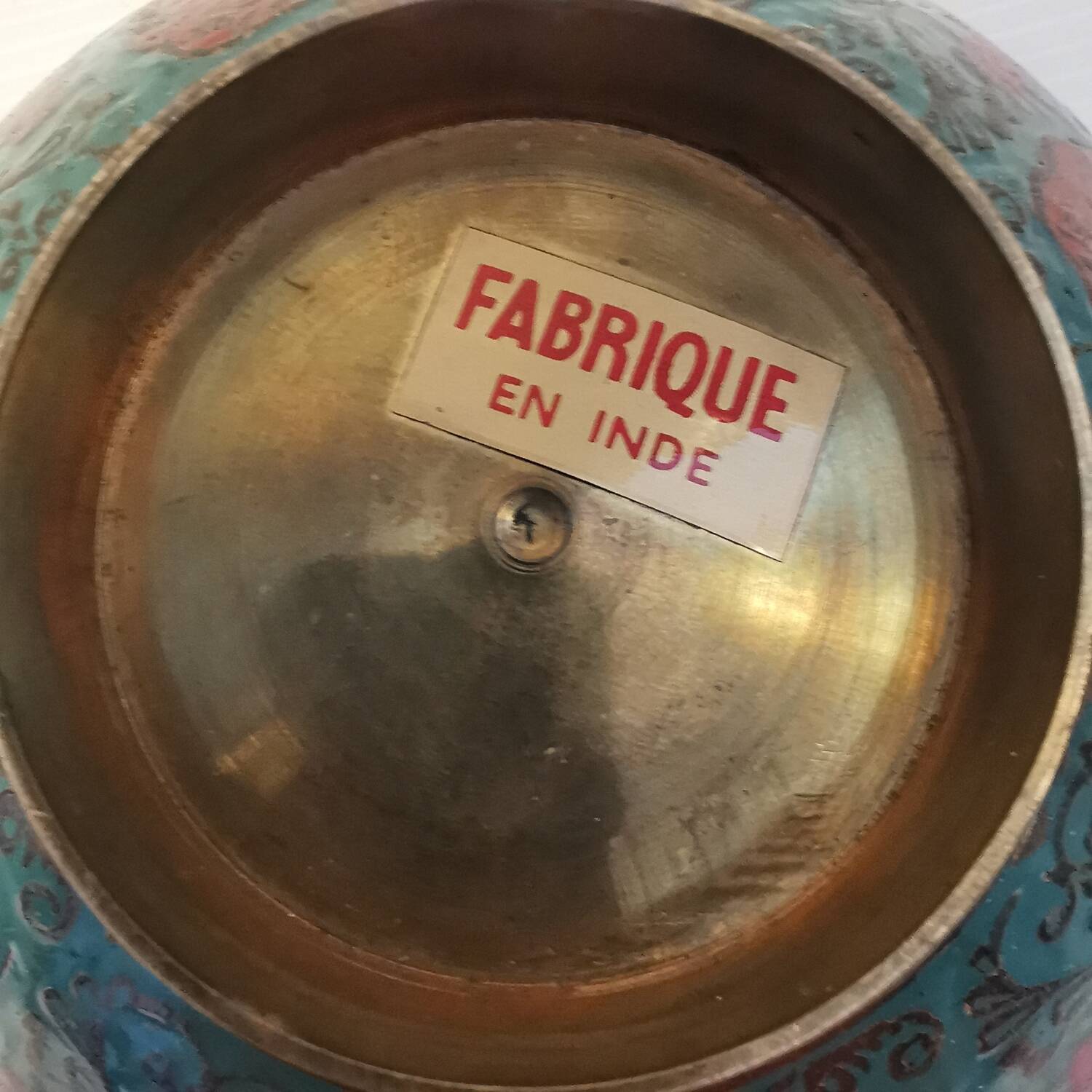 Old Indian brass bowl with peacock decoration