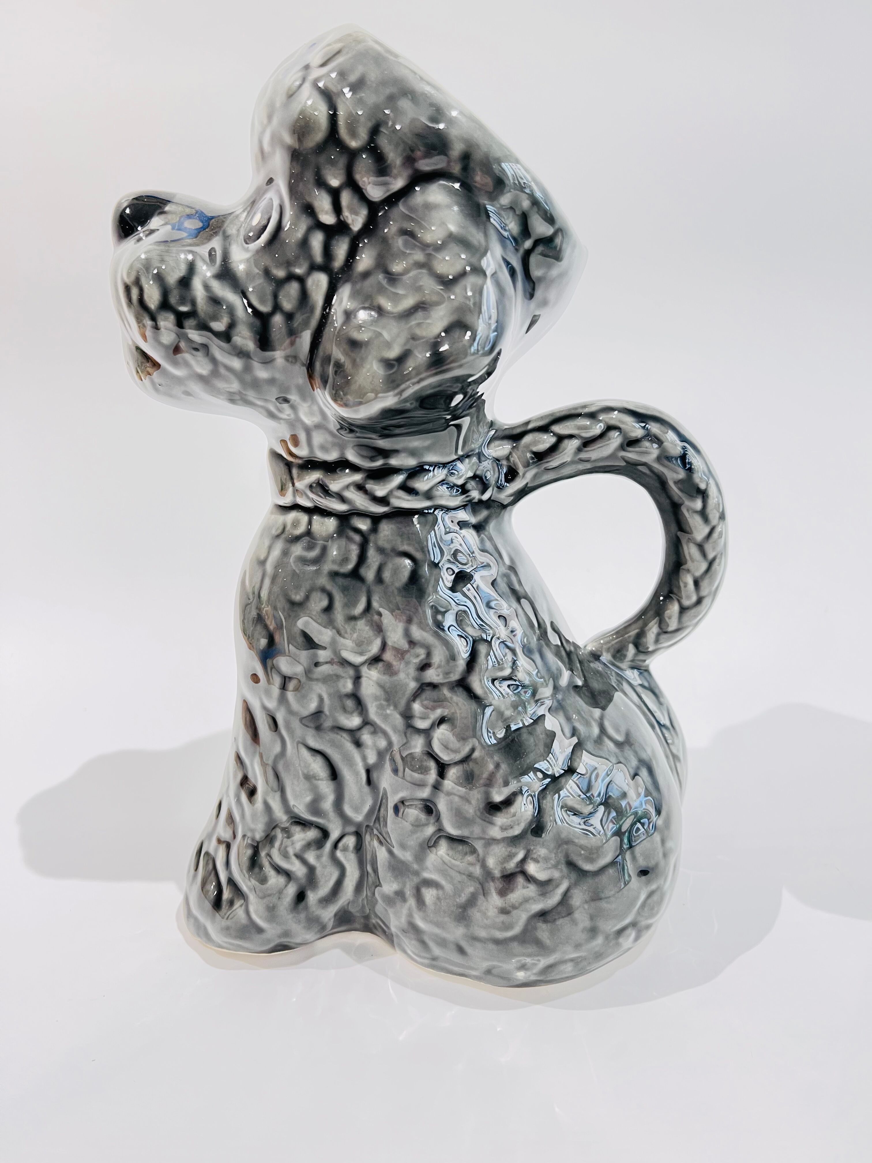 Pitcher in grey poodle slip