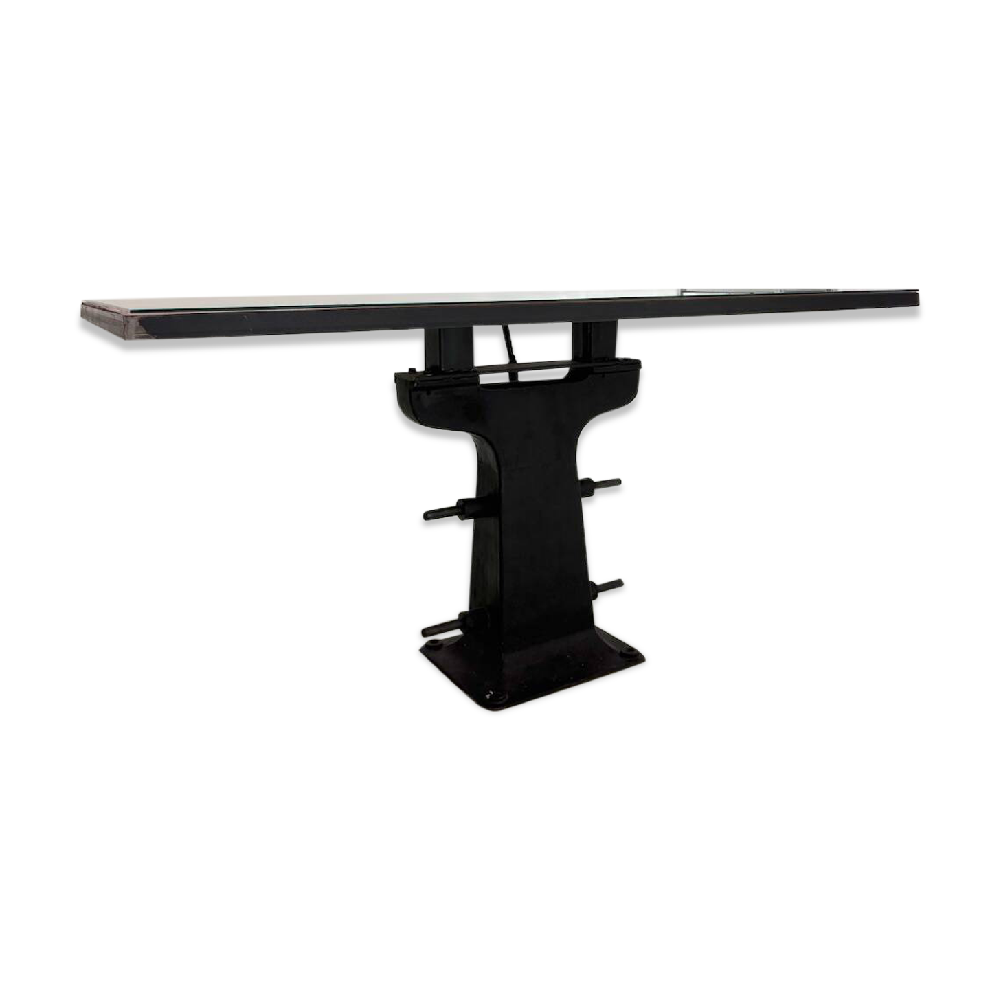 Industrial table with cast iron legs.