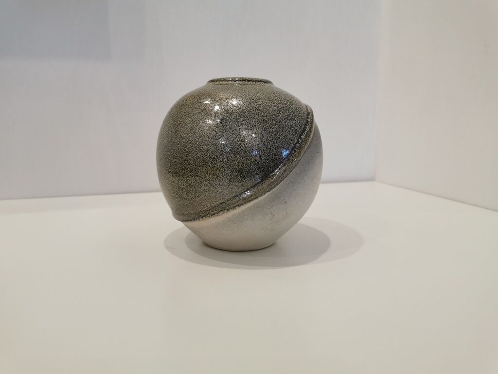 Grey potter's ball vase