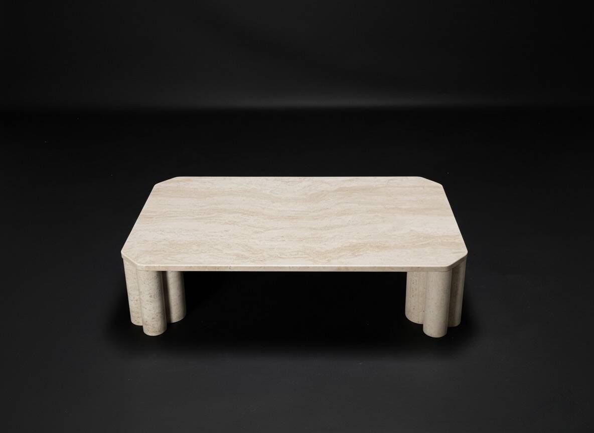 Antona travertine coffee table by the Italian publisher Up&Up.