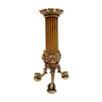Golden candle holder with lion's head and legs
