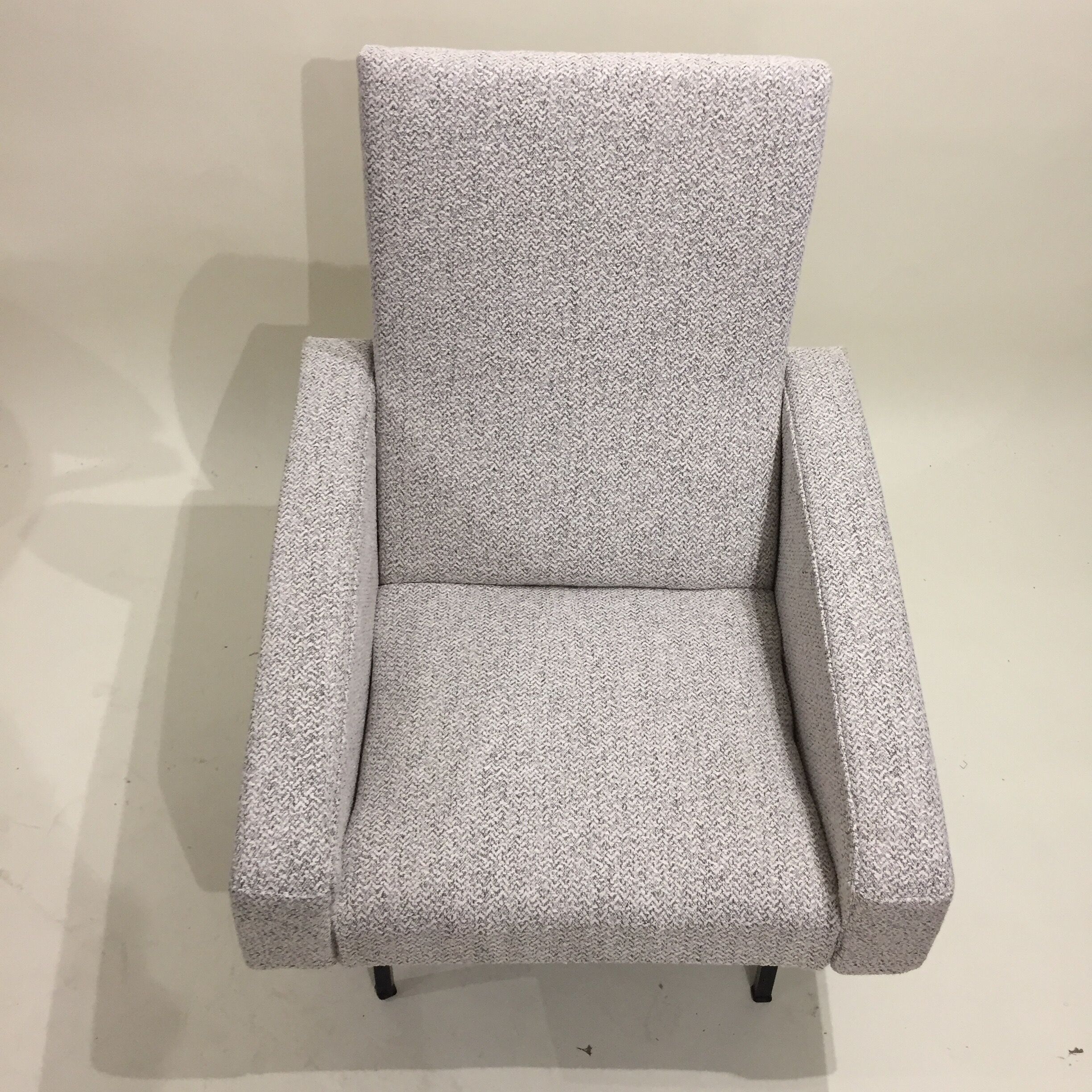 Reupholstered modernist armchair