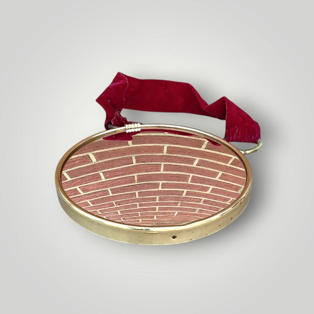 Antique convex "witch's eye" mirror