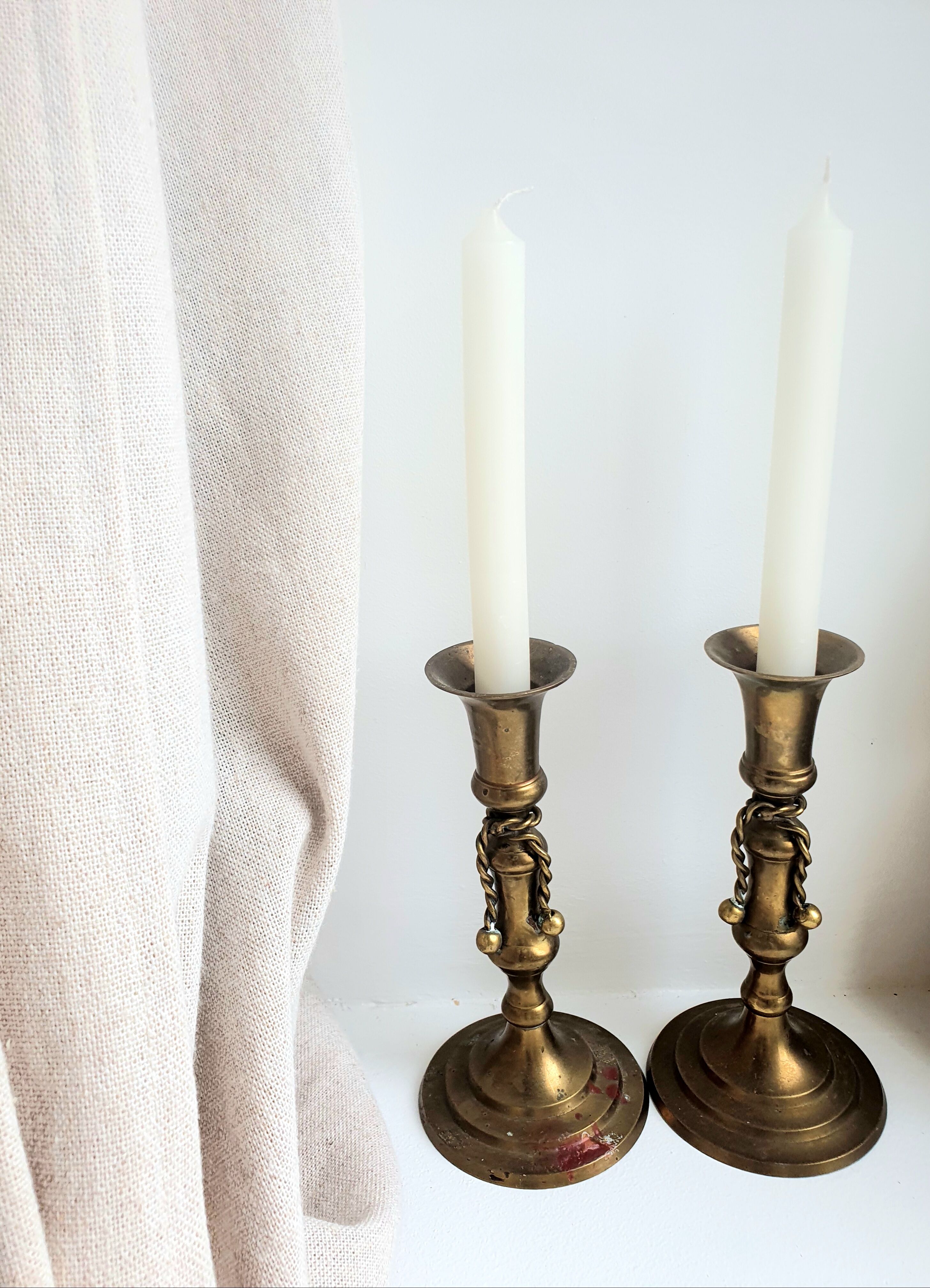 Pair of brass candle holders