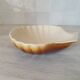 Brown and white ceramic shell bowl