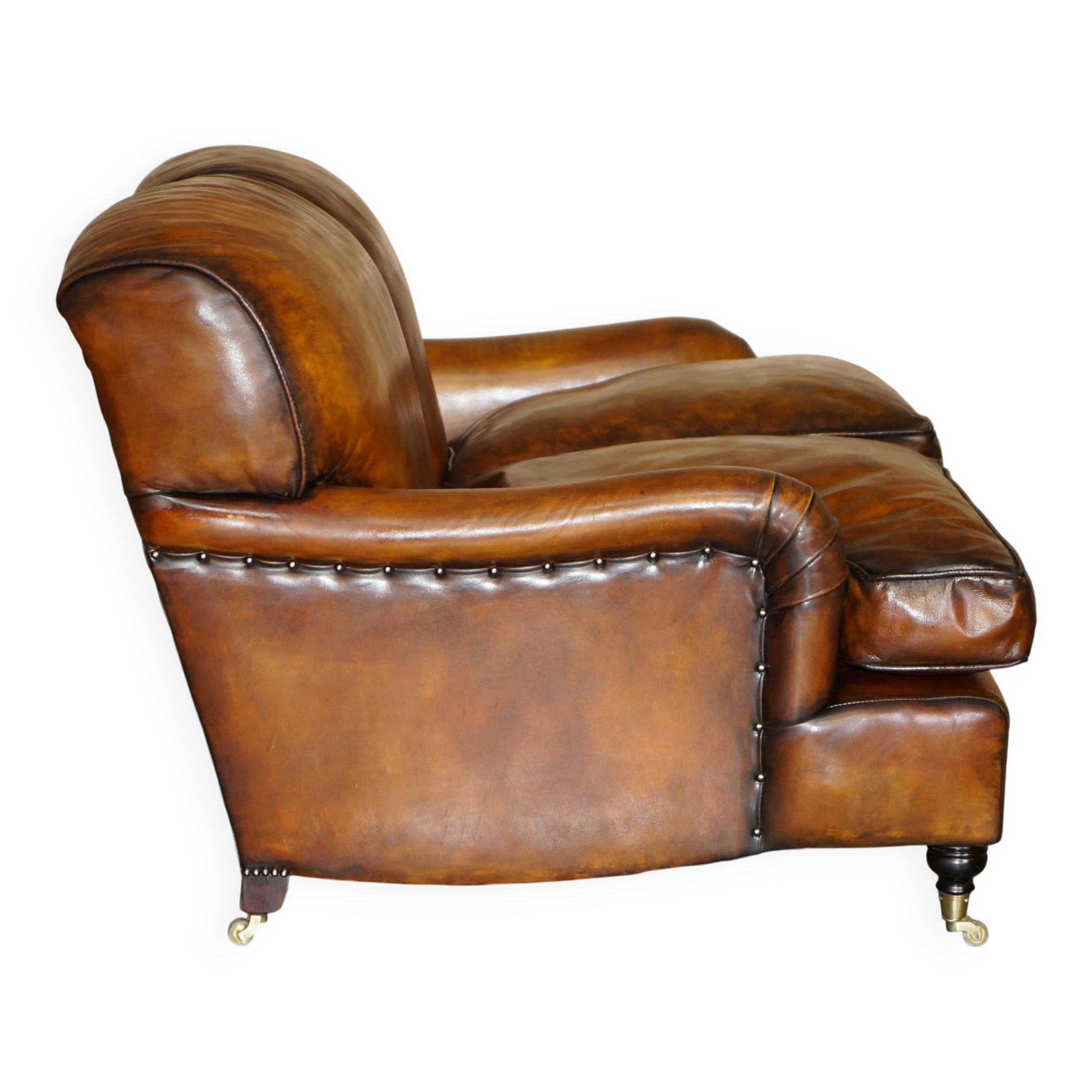 Howard & Son restored leather canapé, width 145 cm