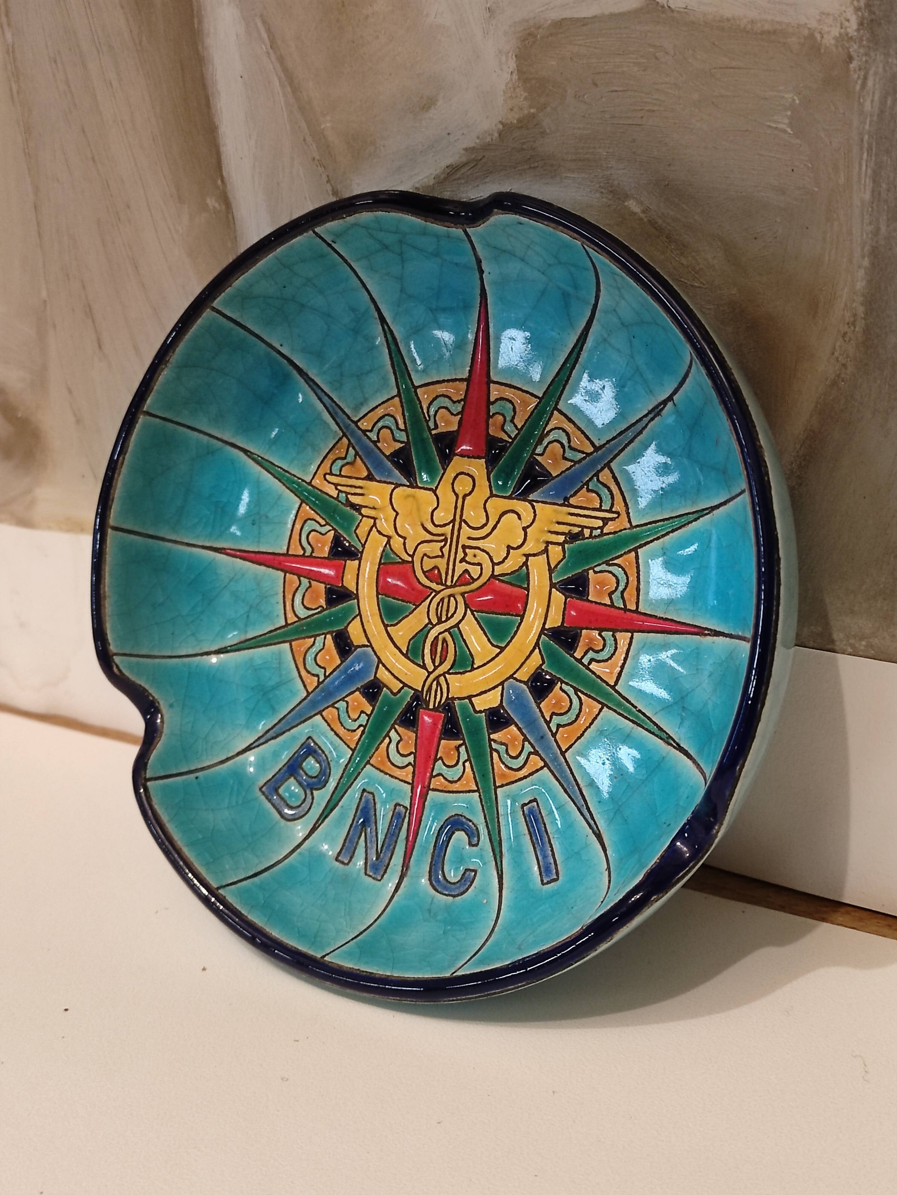 Cup or empty pocket with Epnamels of Longwy advertising