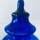 Blue glass apothecary shaped bottle