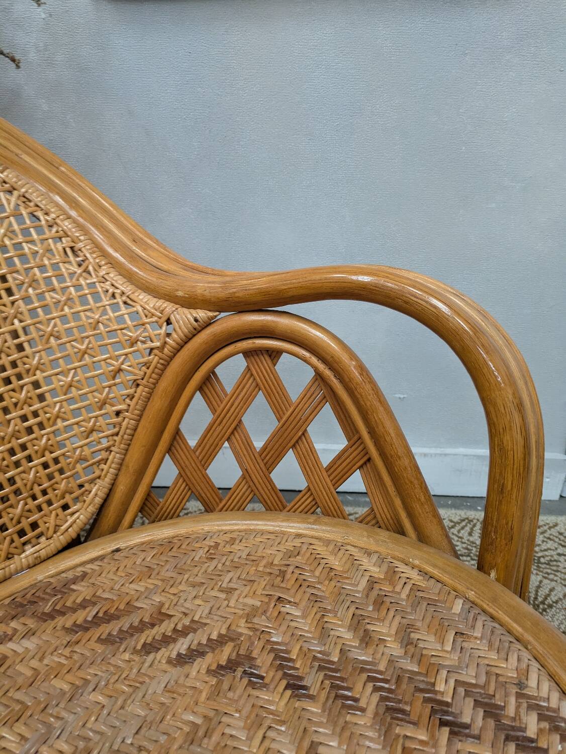 Pair of caned armchairs