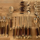 61 covered in rosewood and brass 1950