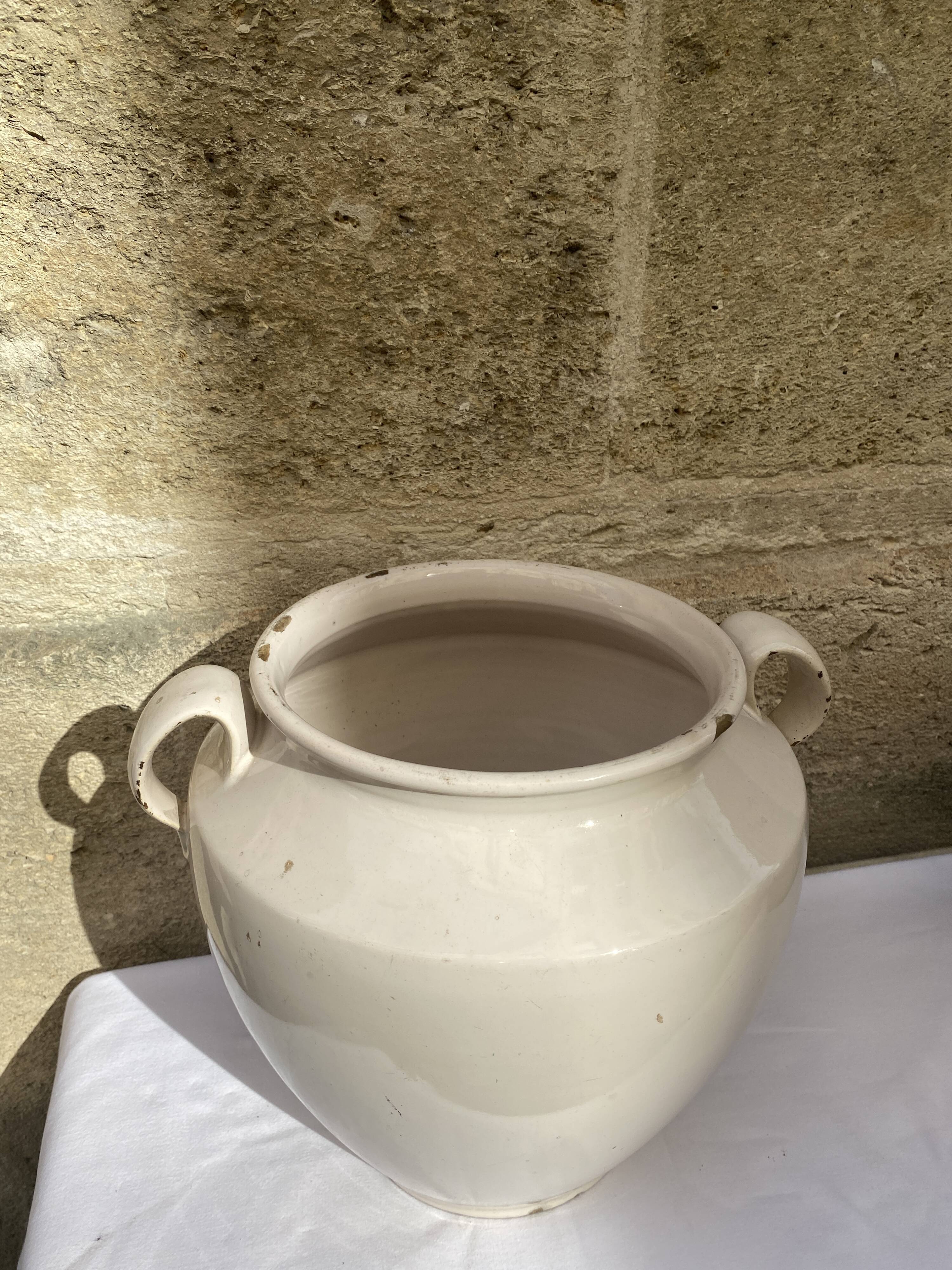 Enamelled terracotta pot