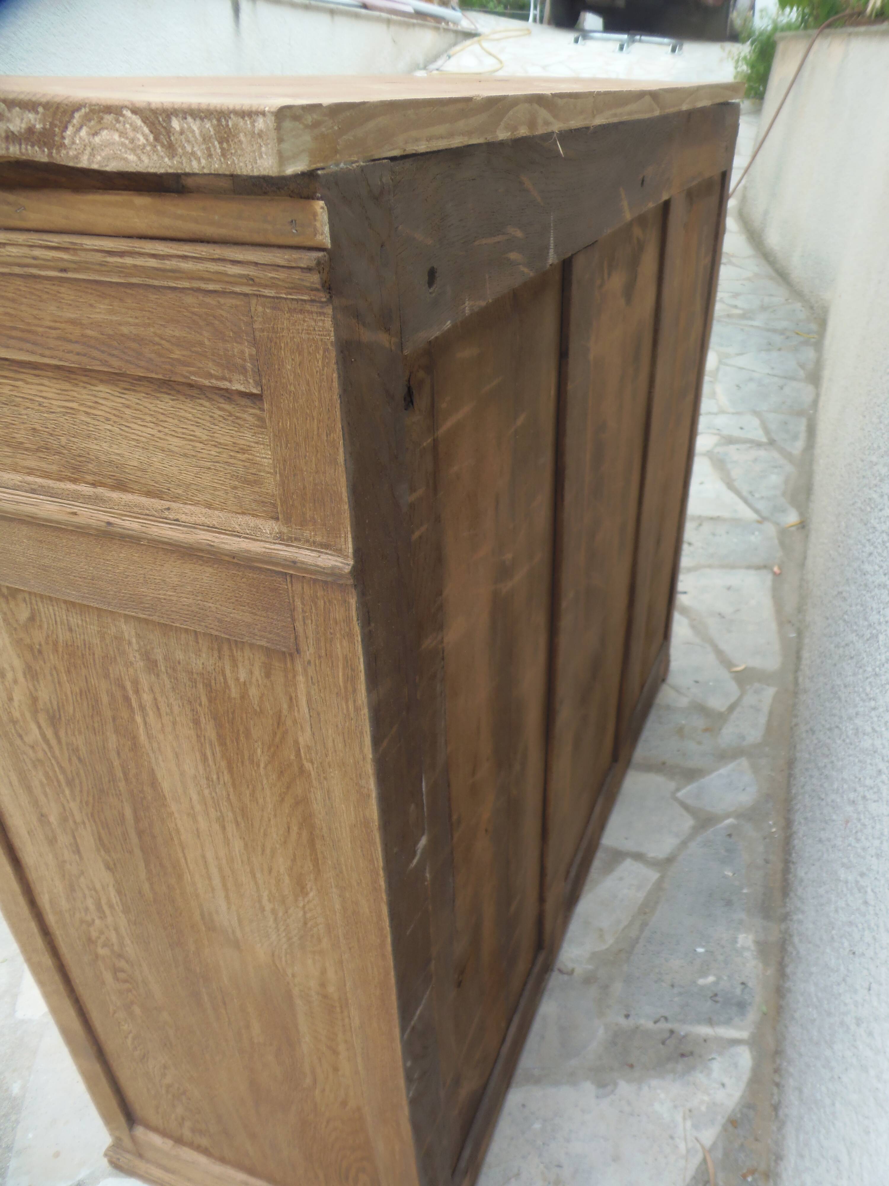 Antique wooden sideboard, fabric doors and pearl grey shelves.
