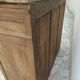Antique wooden sideboard, fabric doors and pearl grey shelves.