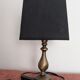Vintage brass lamp. Black lampshade.