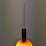 Pair of orange opaline ball pendants by Parscot, France circa 1970.