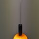 Pair of orange opaline ball pendants by Parscot, France circa 1970.