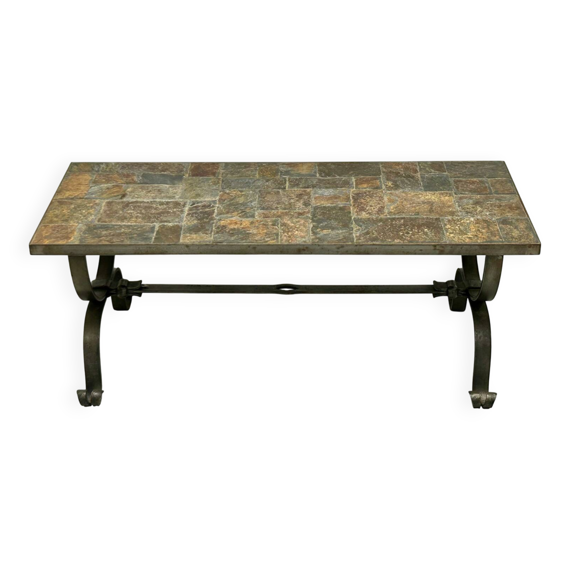 Brutalist-style coffee table made of mixed wrought iron and stone.