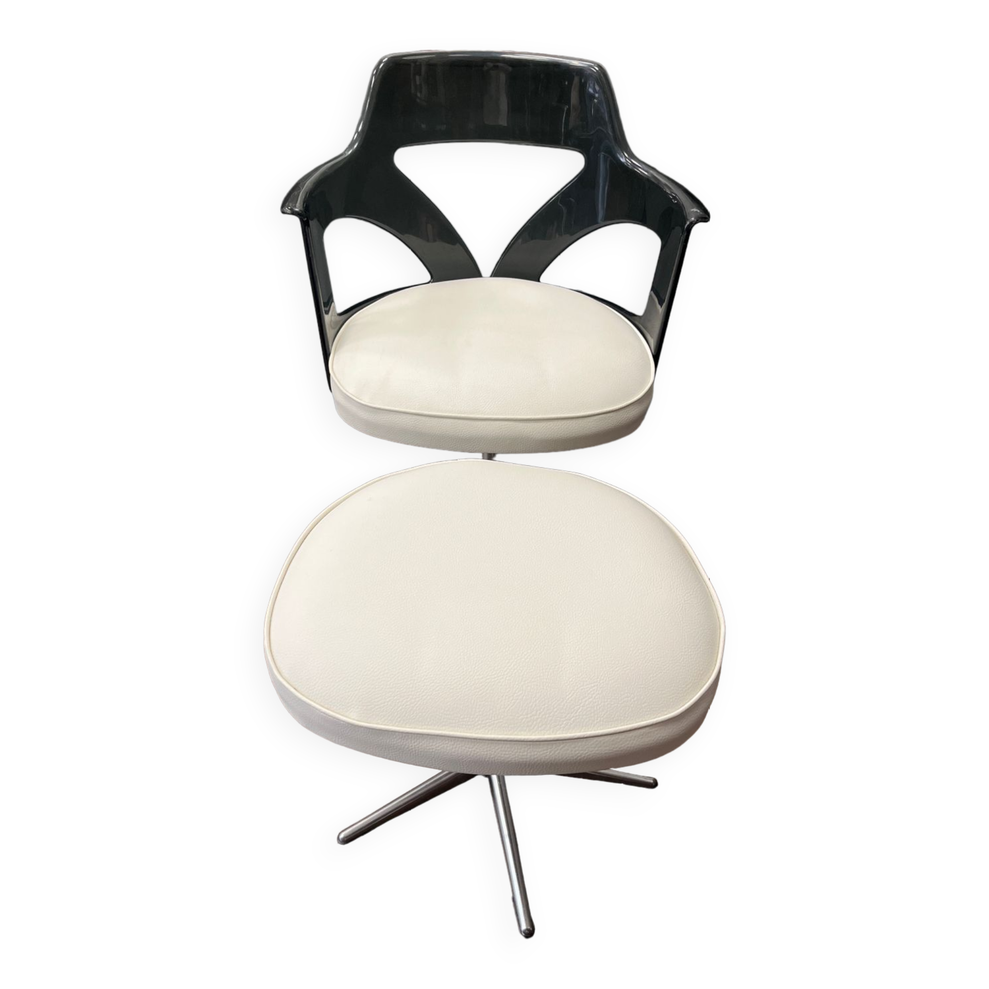 Old hairdressing chair and its footrest