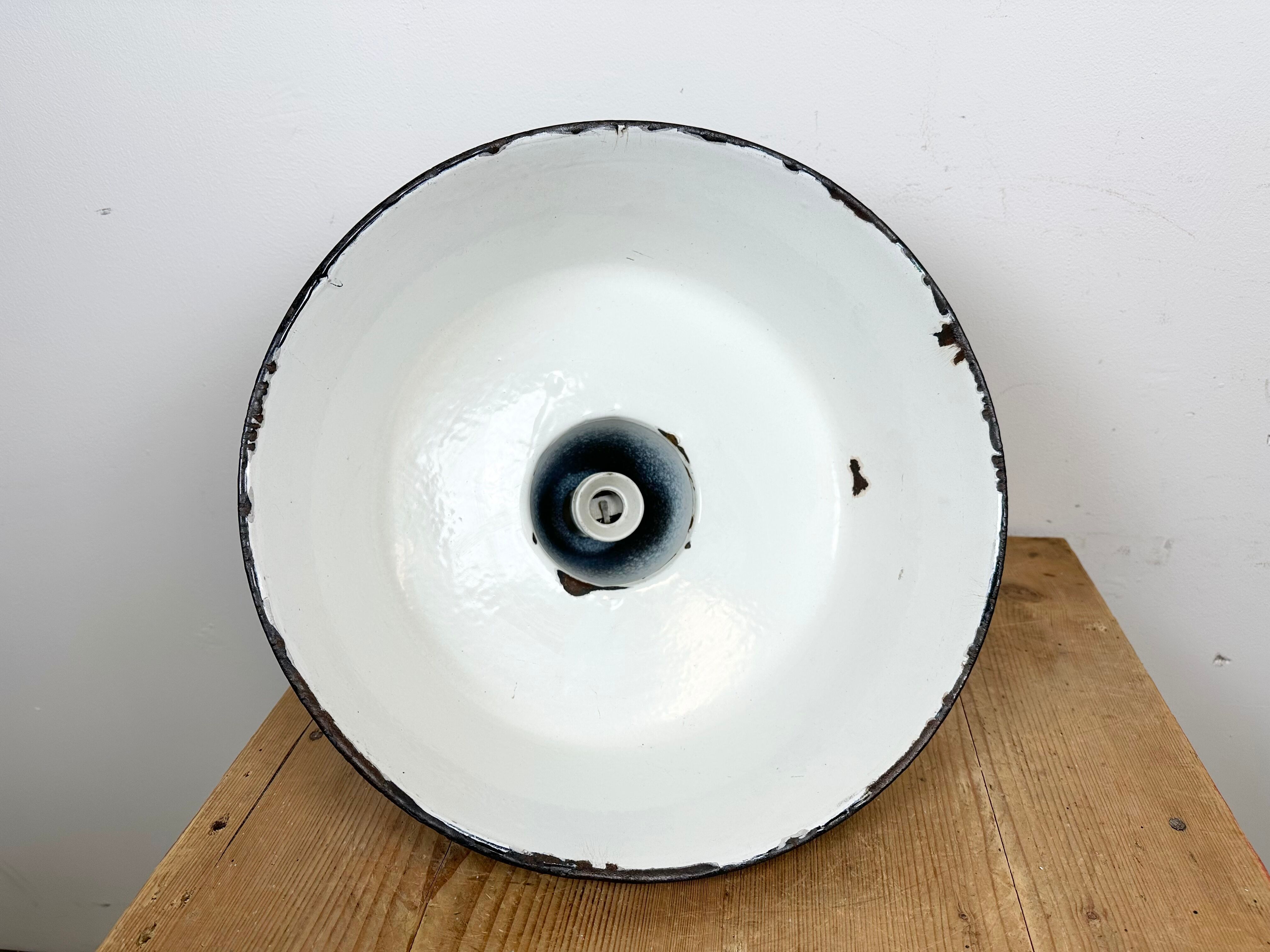 Industrial blue enamel factory lamp with cast iron top, 1960s